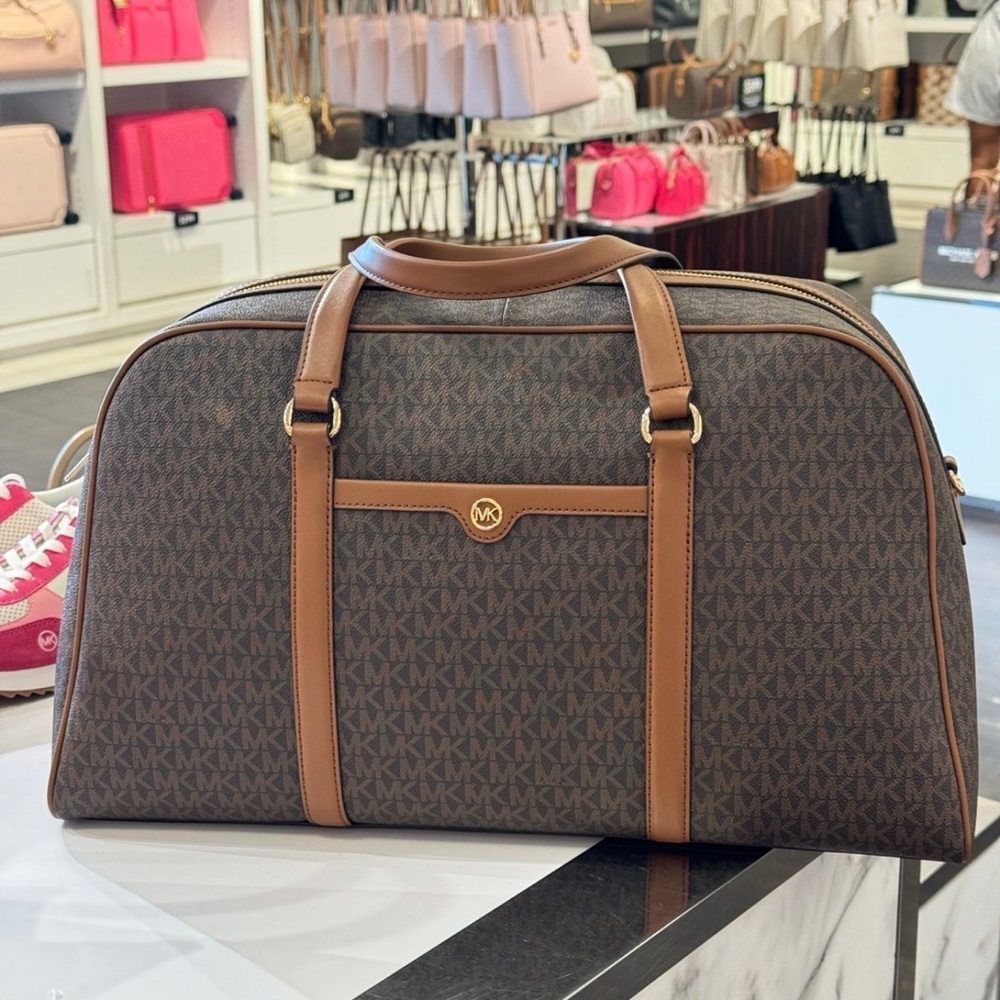 Michael Kors Brown Duffel Bag with Monogram Pattern and Leather Trim